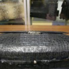 Открытие кодового замка на портфеле из кожи крокодила ALANDA